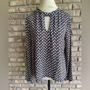 Caramela Graphic Print Long Sleeve Blouse.